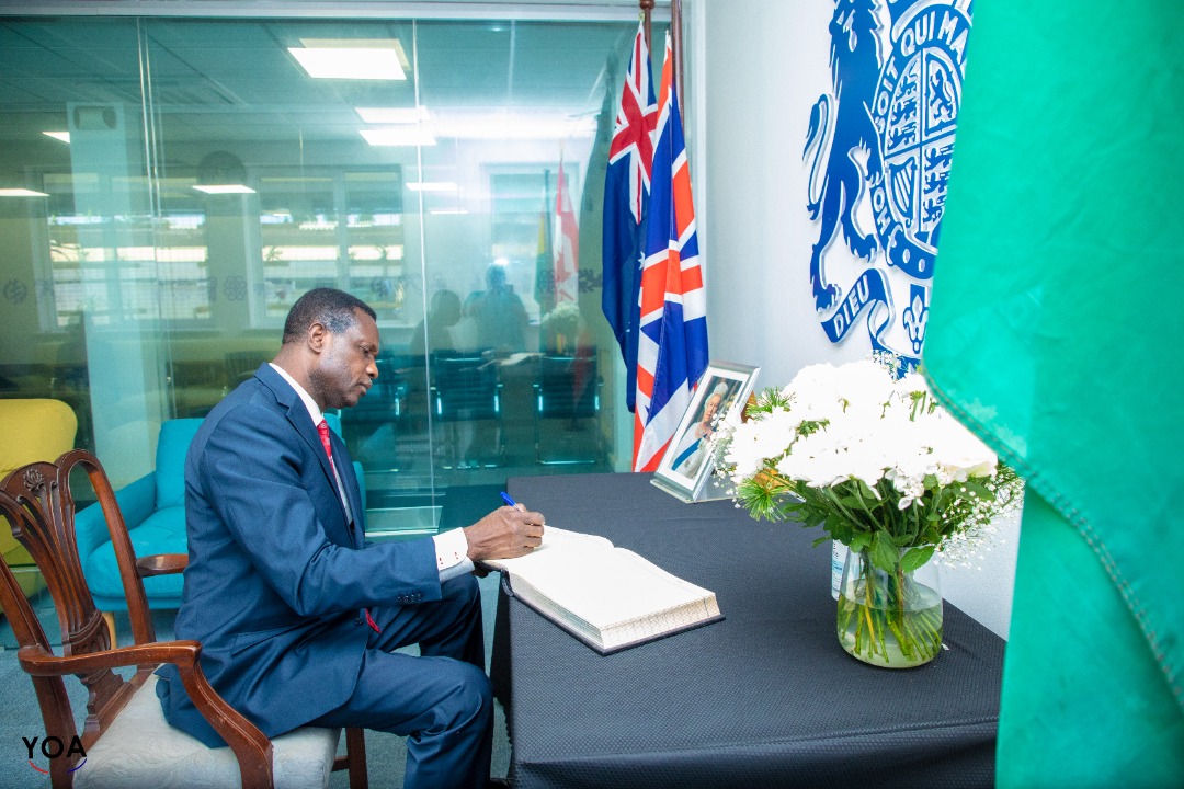 Dr. Adutwum signs the book of condolence in memory of Queen Elizabeth II